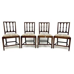 Set four Georgian mahogany dining chairs, carved rail back, drop in upholstered seat, square tapering supports 