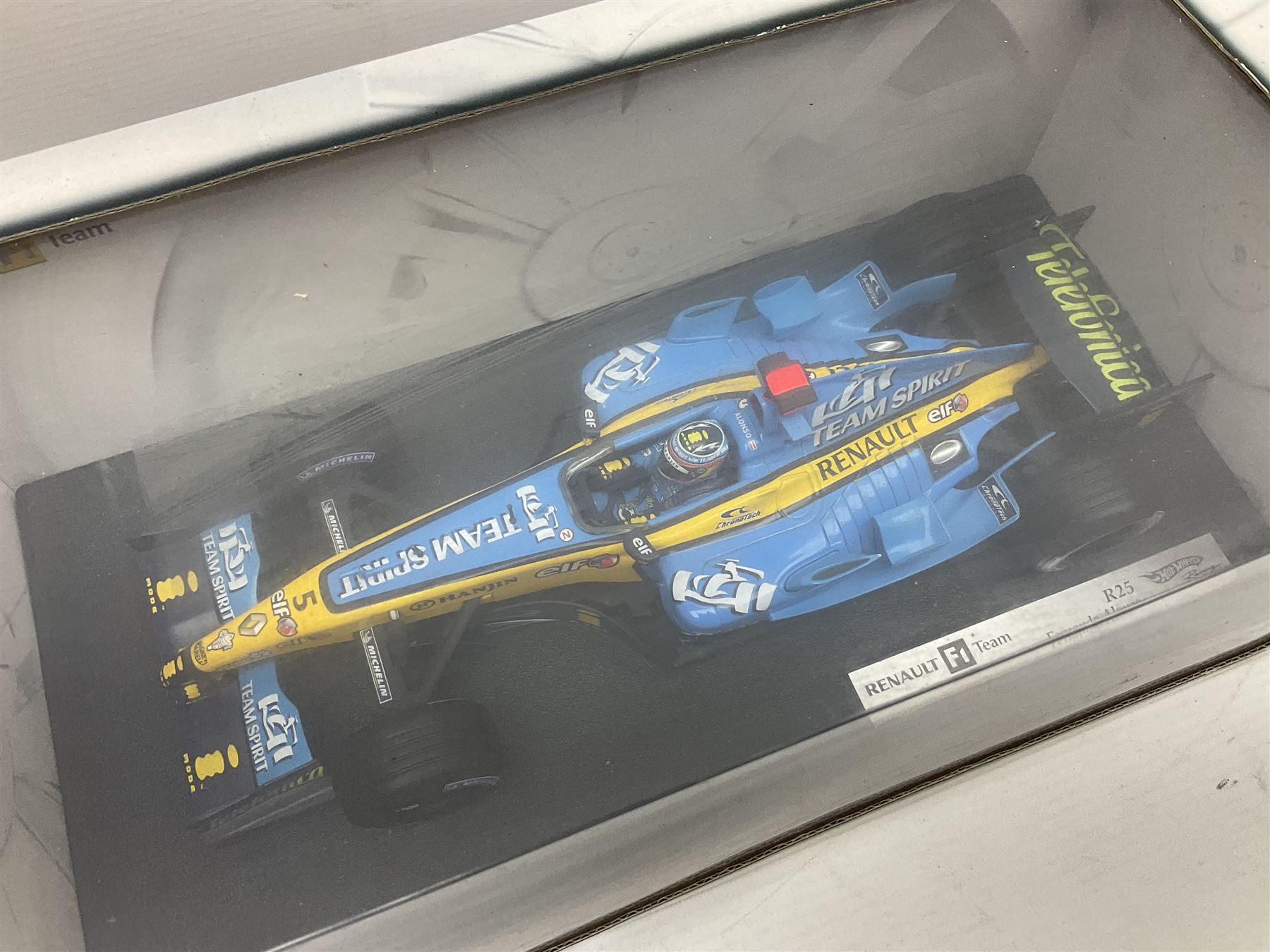 Five Mattel Hot Wheels 1:18 scale die-cast racing cars - Ferrari 248F1 Michael Schumacher, Renault F1 Team R25 Fernando Alonso, Williams F1 Team Williams FW28 Mark Webber, Jordan 199 Damon Hill and Williams F1 Team BMW; all boxed (5)