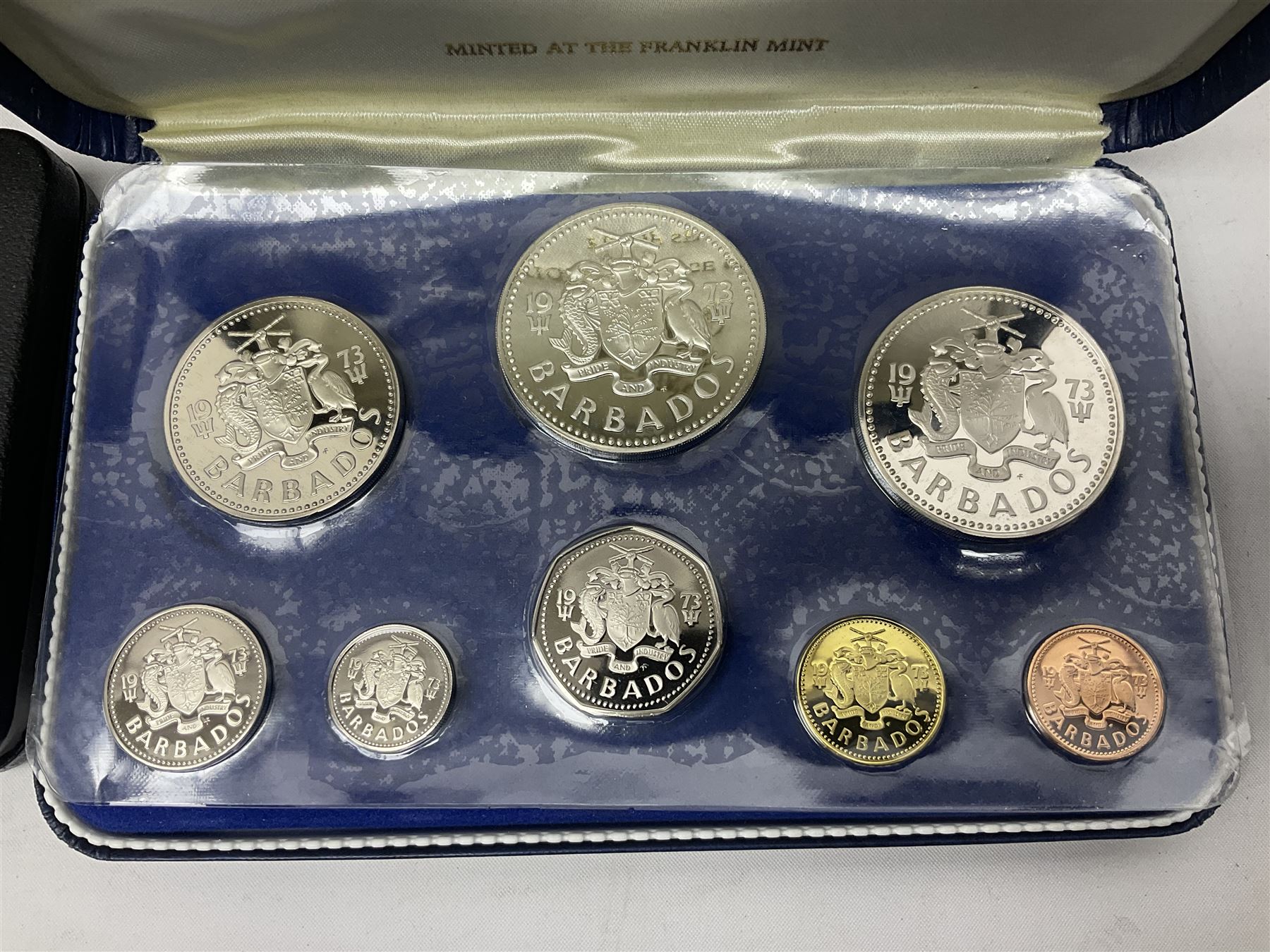 First National Coinage of Barbados 1973 proof eight coin set, from ten dollars to one cent, the ten dollar coin minted in sterling silver, the five dollar coin minted in 800 silver, and a Barbados 1974 proof eight coin set, both minted at The Franklin Mint, cased with certificates; two Republic of Malta decimal proof coin sets, dated 1978 and 1979, the 1979 one pound coin minted in sterling silver, both minted at The Franklin Mint, cased with certificates; Cayman Islands 1973 proof eight coin set, minted at the Royal Canadian Mint, cased; and a Cayman Islands 1979 proof eight coin set, the five dollar to fifty cents coins each minted in sterling silver, minted at the Franklin Mint, cased with certificate (6)
