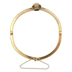 Early 20th century gold opal and diamond hinged bangle, the central opal and rose cut diamond cluster, with channel set rose cut diamonds set either side
