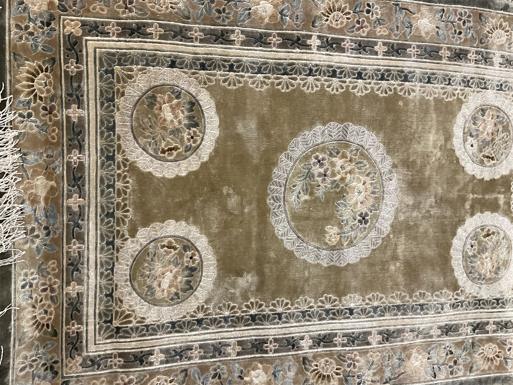 Three Chinese washed woollen rugs - circular blue ground decorated with dragons (D160cm), rectangular light green rug (185cm x 123cm), and a rectangular green rug (185cm x 123cm)