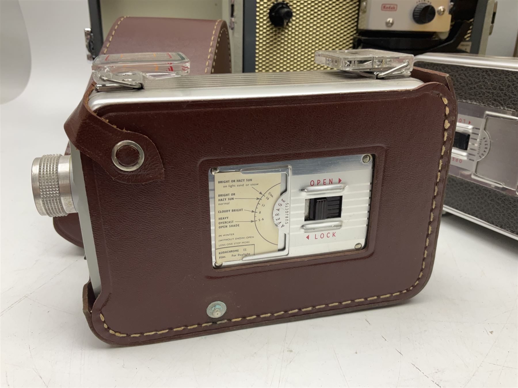 Bolex Paillard P3 Zoom Reflex camera body, serial no 38090, with 'B te S.G.D.G Som Berthiot Pan-Cinor 1:1.9 f=8a 40' lens, serial no. 40251438 in case, Kodak Brownie movie camera, Kodak model 2 Brownie movie camera and a Kodak 8 Movie Projector A-15G and other camera equipment 