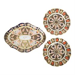 Royal Crown Derby Imari pattern 1128, two plates with fluted rim, together with Royal Crown Derby platter in pattern 6299, plates D22cm