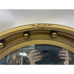 20th century convex circular gilt wall mirror, with a later eagle surmount together with art deco frameless faceted mirror and another convex circular mirror