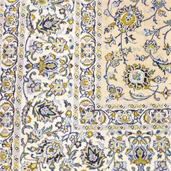 Central Persian Kashan hand-knotted carpet, pale ivory ground, decorated with an all-over scrolling floral design of palmettes rosettes, and leafy vine work enclosed by a wide floral border and multiple guard borders in tones of soft blues, sage green, muted gold, and ivory, with cotton fringe ends