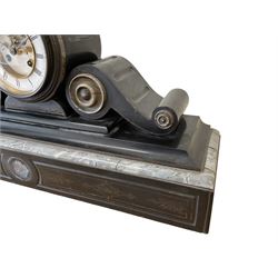 French- late 19th century 8-day Belgium slate and marble mantle clock, drum movement with volutes and conforming scroll side pieces, on a stepped plinth with incised decoration to the front, two-piece enamel dial with a visible Brocot deadbeat escapement, spade hands and Roman numerals, twin train, countwheel striking movement, sounding the hours and half-hours on a bell. With pendulum and key. 