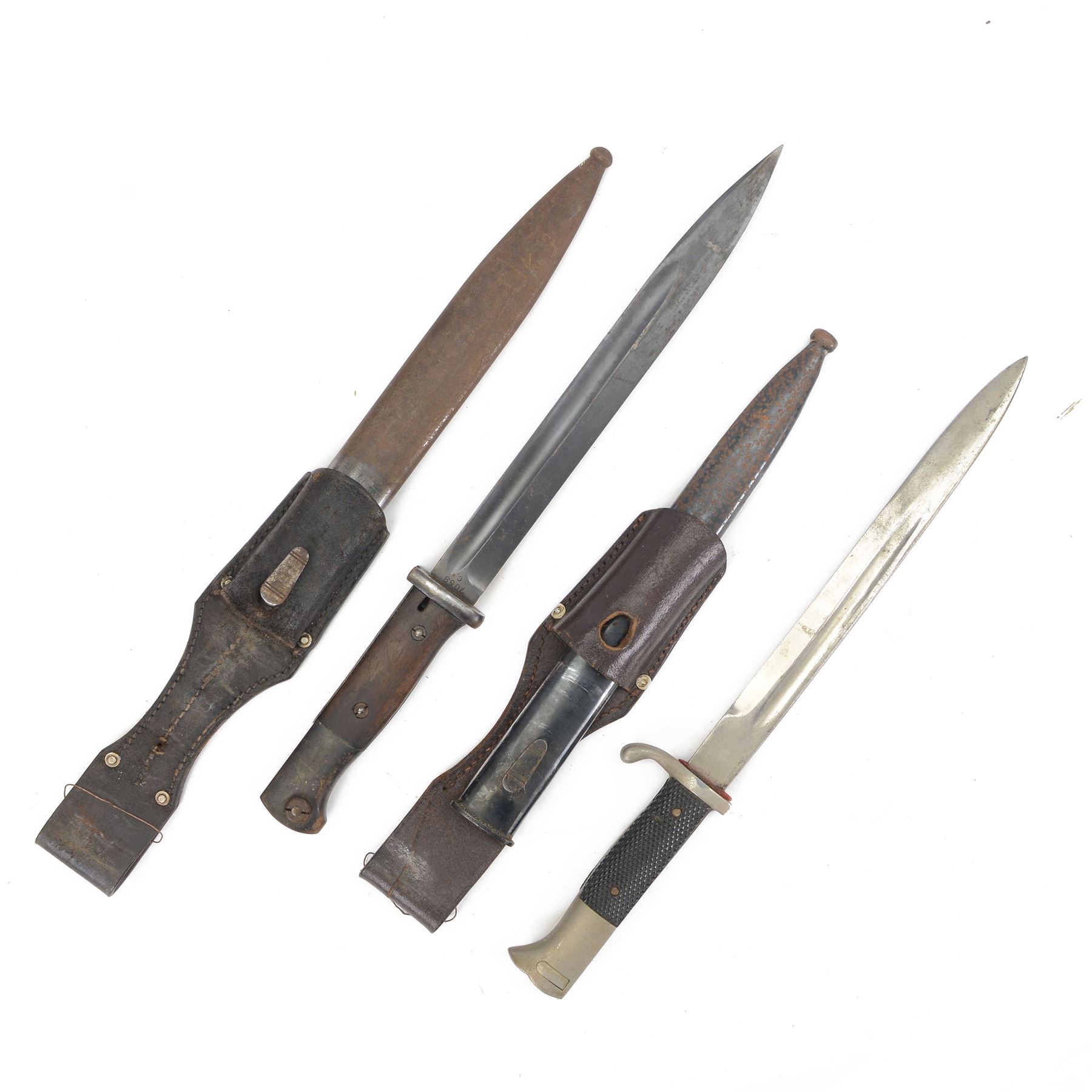 WWII German bayonet marked S/174, in scabbard, with leather frog, the frog marked H. Glemen Elberfeld 1938, together with another German bayonet and frog  
