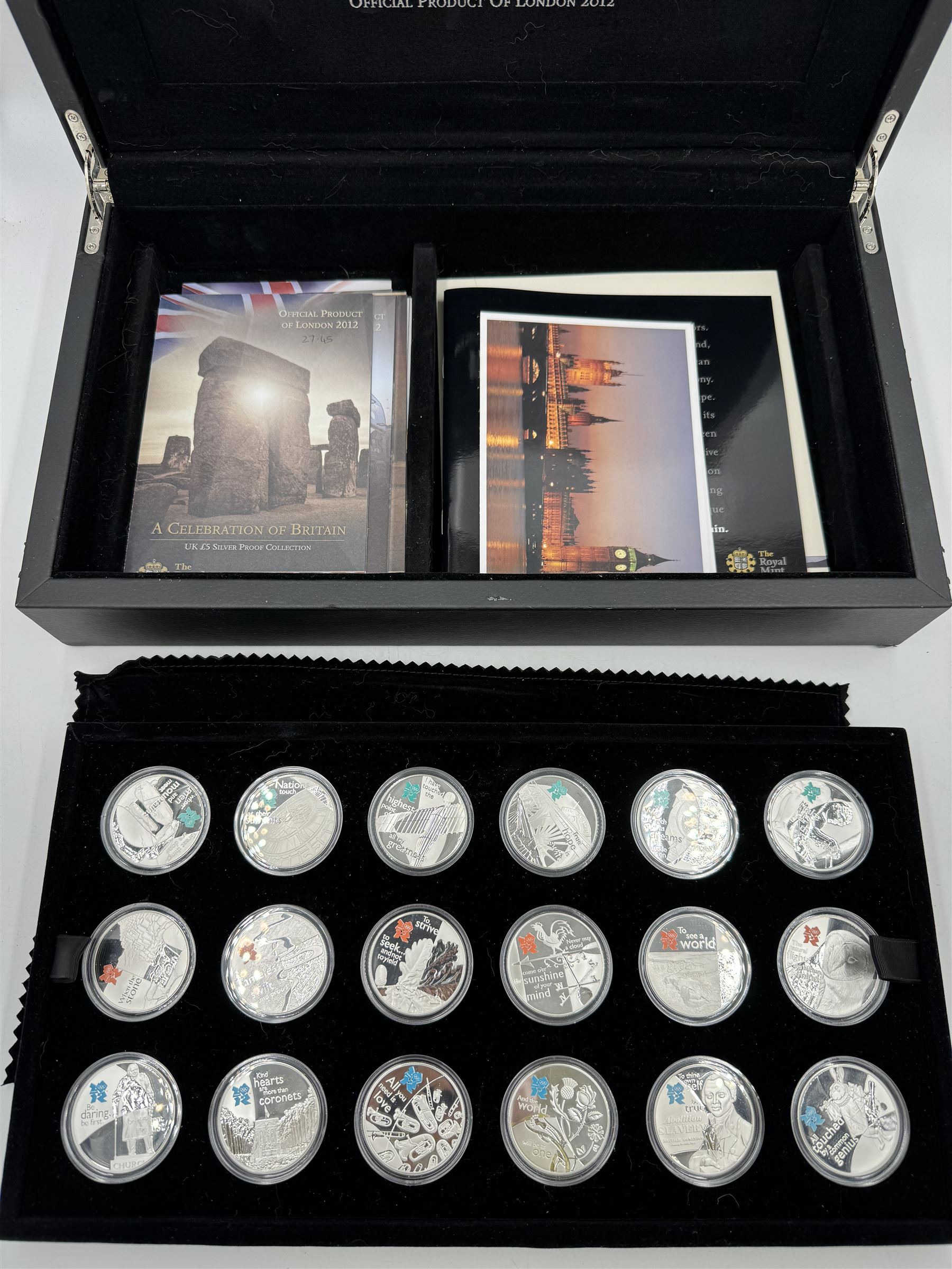 The Royal Mint United Kingdom 'A Celebration of Britain' silver proof coin set, comprising eighteen five pound coins relating to the London 2012 Olympic Games, housed in display case with certificates