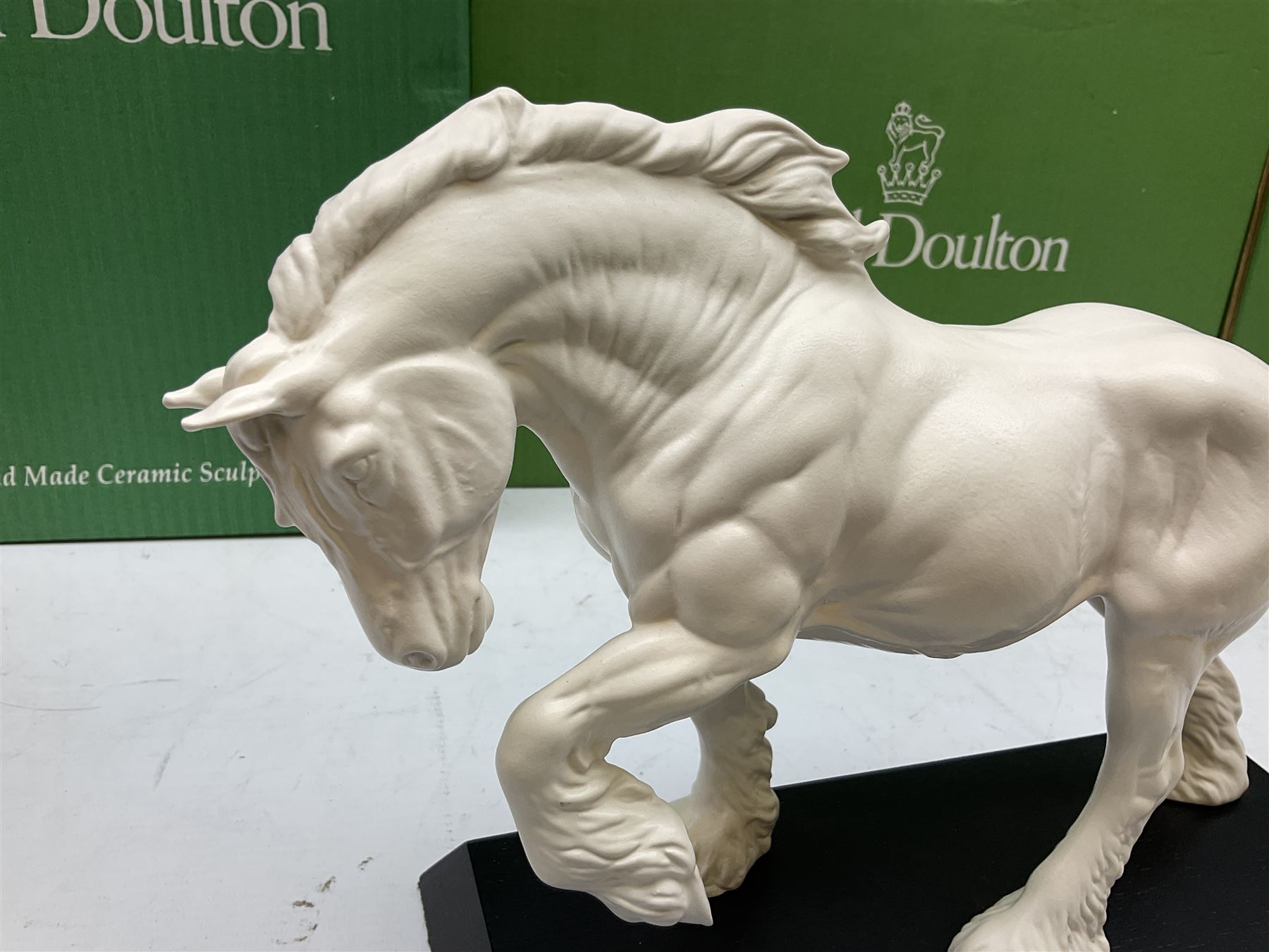 Five Beswick and Royal Doulton horse figures in matt white on black plinths, comprising of  Spirit of Affection no. 2689/2536, Springtime no.2837, Spirit of peace no.2916, Spirit of earth no.2914 and Spirit of the wild no. 183, together with a composite figure of a horse (6)