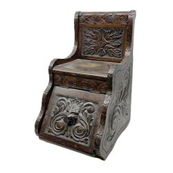 19th Century stained oak chair, possibly a child's box seat, carved with ornate scrolling detail and green man mask to the lift up hinged lid revealing a hidden compartment below the seat, H62cm