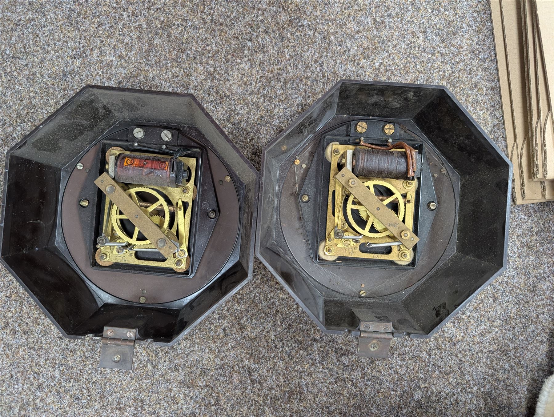 Pair of Gents Bakelite octagonal slave clocks