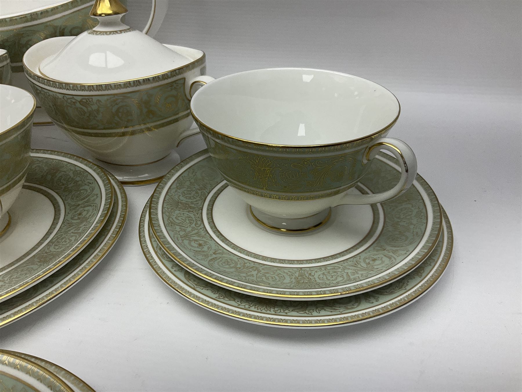 Royal Doulton English Renaissance pattern tea service, comprising teapot, milk jug, open sugar bowl, covered sugar bowl, seven cups, eight saucers and eight side plates (27)