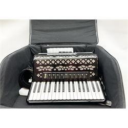 Italian E. Soprani piano accordion in black and silver case, twenty keys and seventy-two buttons L41cm; in soft carrying case