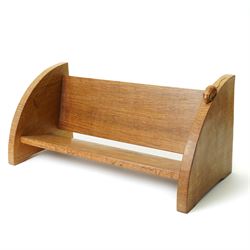 Mouseman - adzed oak book trough, curved end supports, with carved mouse signature, by the workshop of Robert Thompson of Kilburn