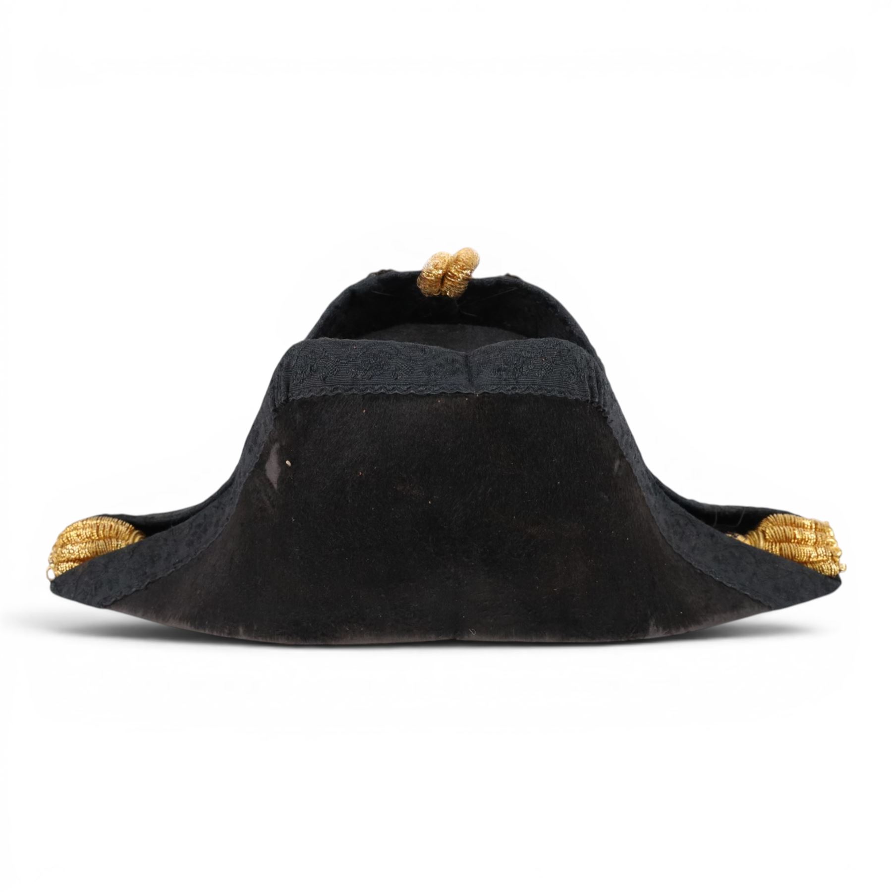 Early 20th century Royal Navy officers full dress bicorn hat, belt and epaulettes, the bicorn in black with gilt wire side and RN button, bullion work to each end marked to the interior with Gieves makers mark, all housed in fitted case
