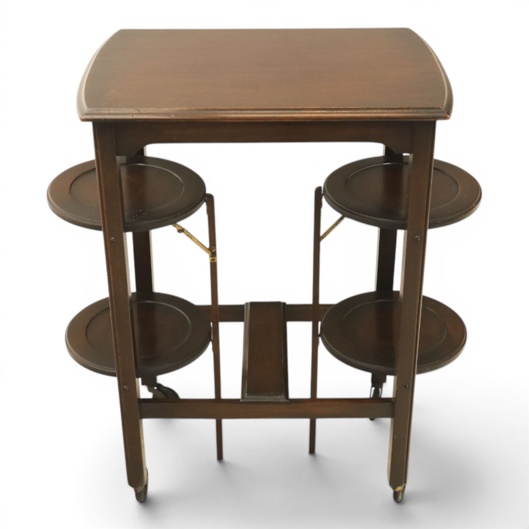 Early 20th century side table with double cake stand, rectangular moulded top, cake stands either side with support, raised on square legs terminating in castors