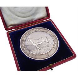 Edwardian silver medal, of circular form, embossed to front with a bay horse and inscribed Cleveland Bay Horse Society, engraved verso 1904 Egton Show won by Rock Dove No 1000 bred at Rock Head by W Duell, hallmarked Vaughton & Sons, Birmingham 1903, contained within fitted case, D6.3cm