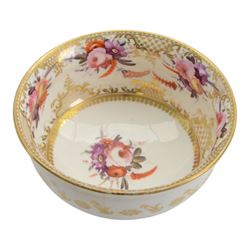 Coalport teawares, circa 1820-1840, comprising set of four trios, coffee cups, teacups and saucers, and slop bowl, decorated in the 830 pattern, with floral sprays and gilt shaped reserves, two further coffee cups and saucers, decorated with floral sprays upon blue grounds/with blue borders, and a similar coffee cup