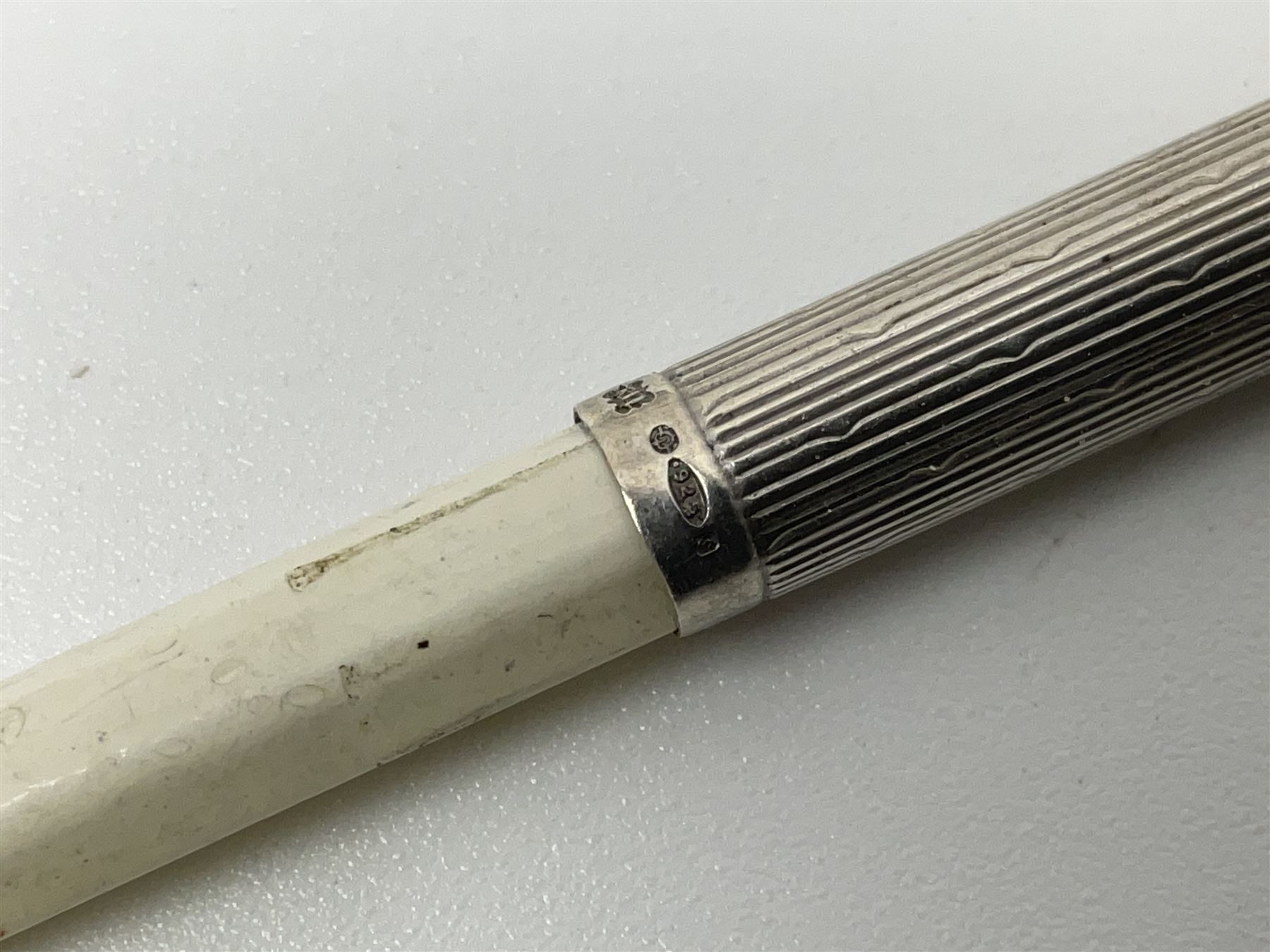 Victorian style silver chatelaine necklace, suspending eight silver sewing and similar accessories, including tape measure, needle case, pencil holder, powder compact and pill box