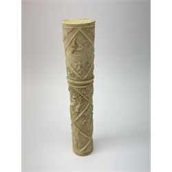 An early 20th century carved ivory bodkin case, carved in low relief with lozenges containing shells, seed pods and birds, and figures, containing four bodkin needles, H11.5cm, together with an early 20th century Chinese carved Canton napkin ring, D4.5cm. 