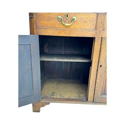 19th century and later oak dresser, moulding cornice a pierced and shaped frieze, over two open plate shelves above a base fitted with two drawers with brass swan neck handles, over panelled twin cupboard with single shelf, cantered corners on bracket feet