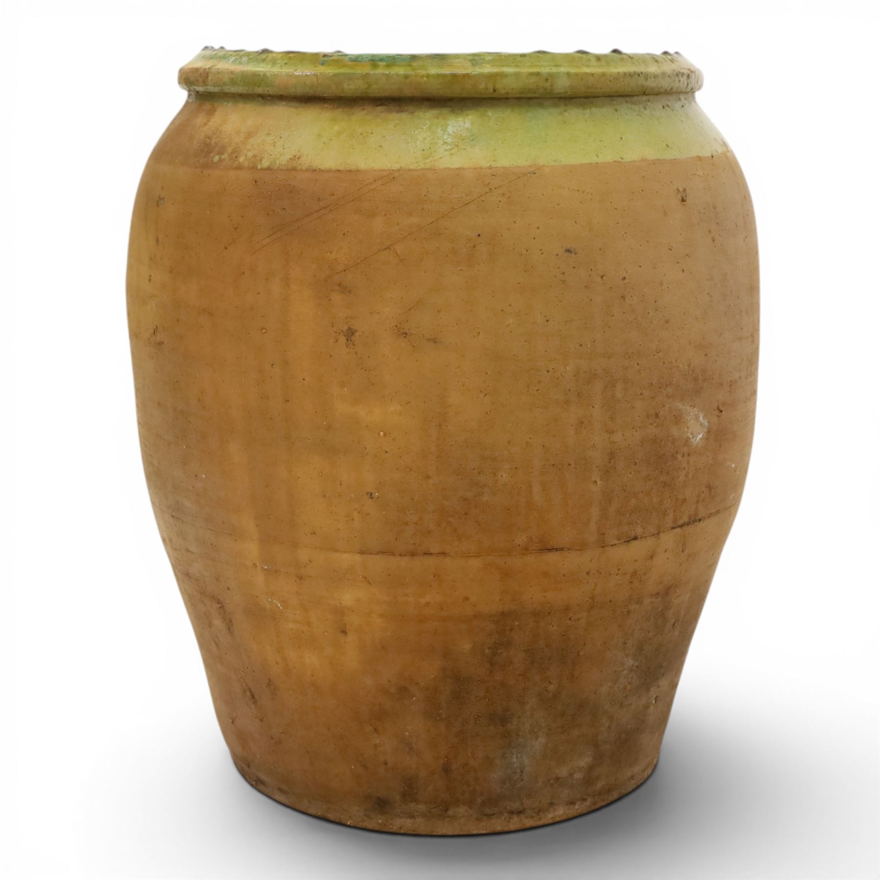 Large Continental terracotta olive jar, of typical baluster form with a green glaze band decoration, H46cm