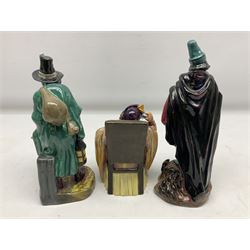 Three Royal Doulton figures, comprising The Pied Piper HN2102, The Mask Seller HN2103 and The Foaming Quart HN2162, all with printed marks beneath