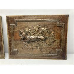 Pair of oak furniture door panels, carved in relief with a fox to one and a hound to the other, together with a pair of smaller oak panels, carved in relief with a hare to one and a grouse to the other, doors W63.cm x H62cm, panels W43cm x H60cm