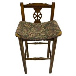 Old Charm - canted oak drinks bar, arched apertures set with mottled and bullseye colour glass panes, and three stools