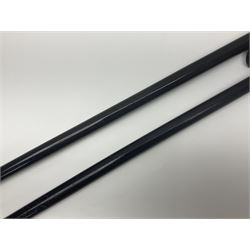Two ebonised walking sticks, one with 'Leeds City Police' embossed top, tallest H92cm