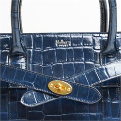 Mulberry - Belted Bayswater with Zip handbag in Midnight Croc embossed leather, the structured body with twin rolled top handles, detachable and adjustable shoulder strap, gold-tone Postman’s Lock fastening, belted front detail and zip closure, burgundy suede interior, with original dust bag
