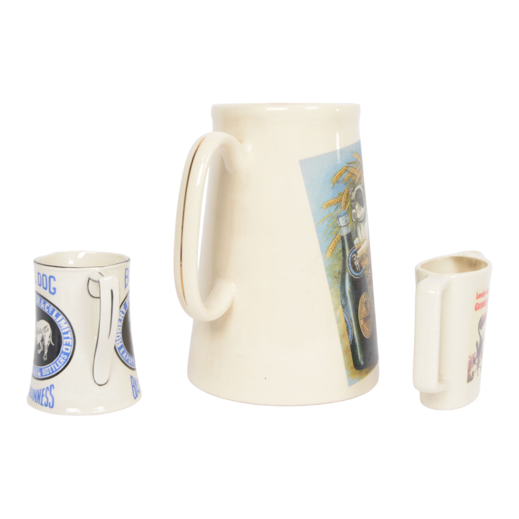 The Hill Church Potteries Bulldog Bass and Guinness Robert Porter & Co water jug, together with another Robert Porter and Co jug and Lovely Day for a Guinness jug, largest H23cm