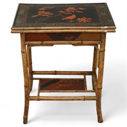 Late Victorian bamboo and lacquered card table, the top decorated with birds and floral sprays, hinged to reveal a baize playing surface, on bamboo effect legs with lacquered undertier