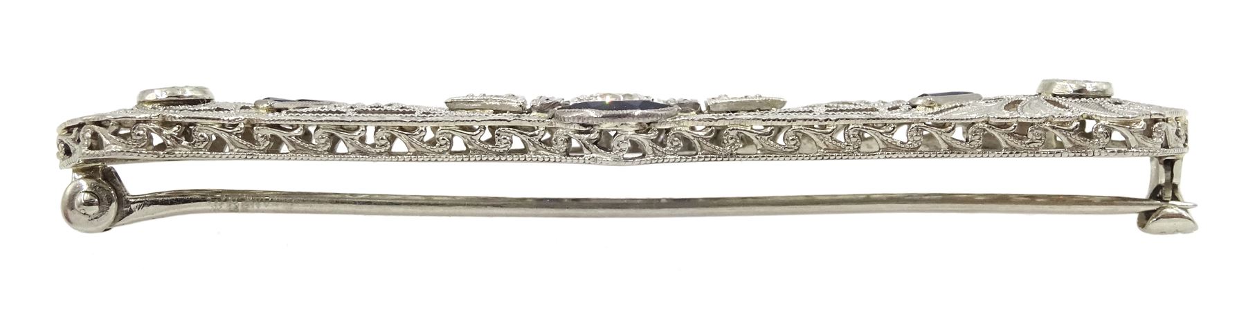Art Deco platinum diamond and vari-cut synthetic sapphire bar open work brooch, in Charles Packer & Co Ltd, Regents Street, London box