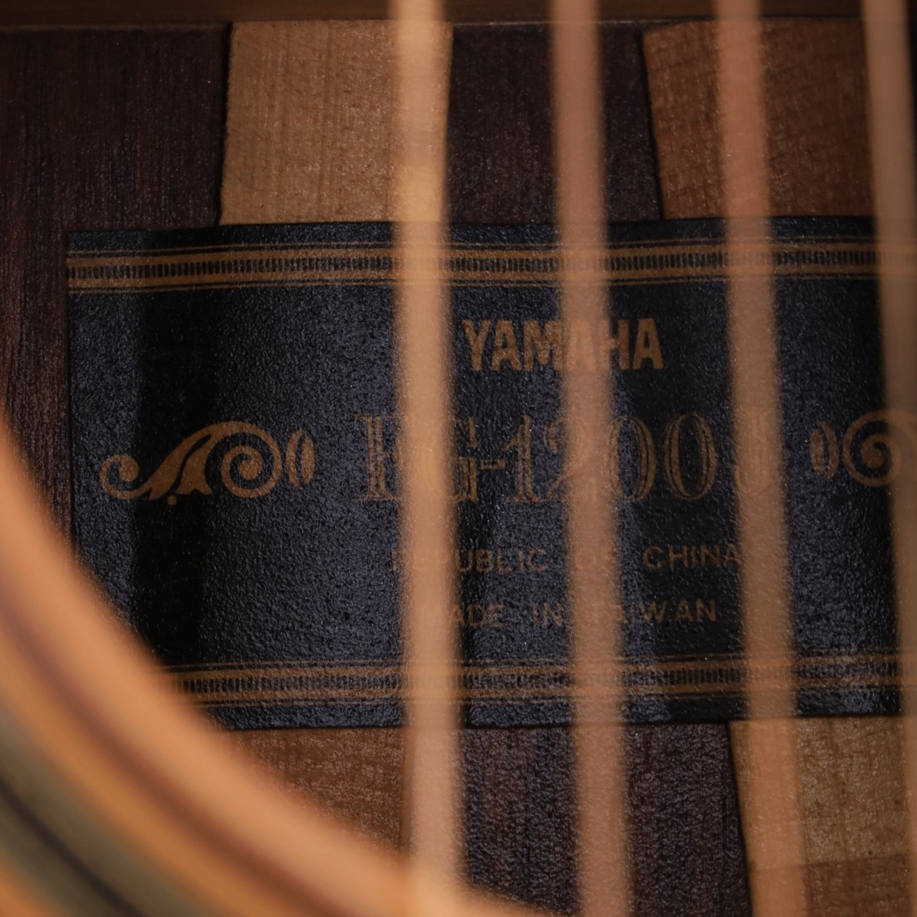 Yamaha FG-1200J acoustic guitar, made in Taiwan circa 1976, serial no. 60714221, with mother of pearl inlay to body, finger board and back, contained within a fitted hardcase, L103cm