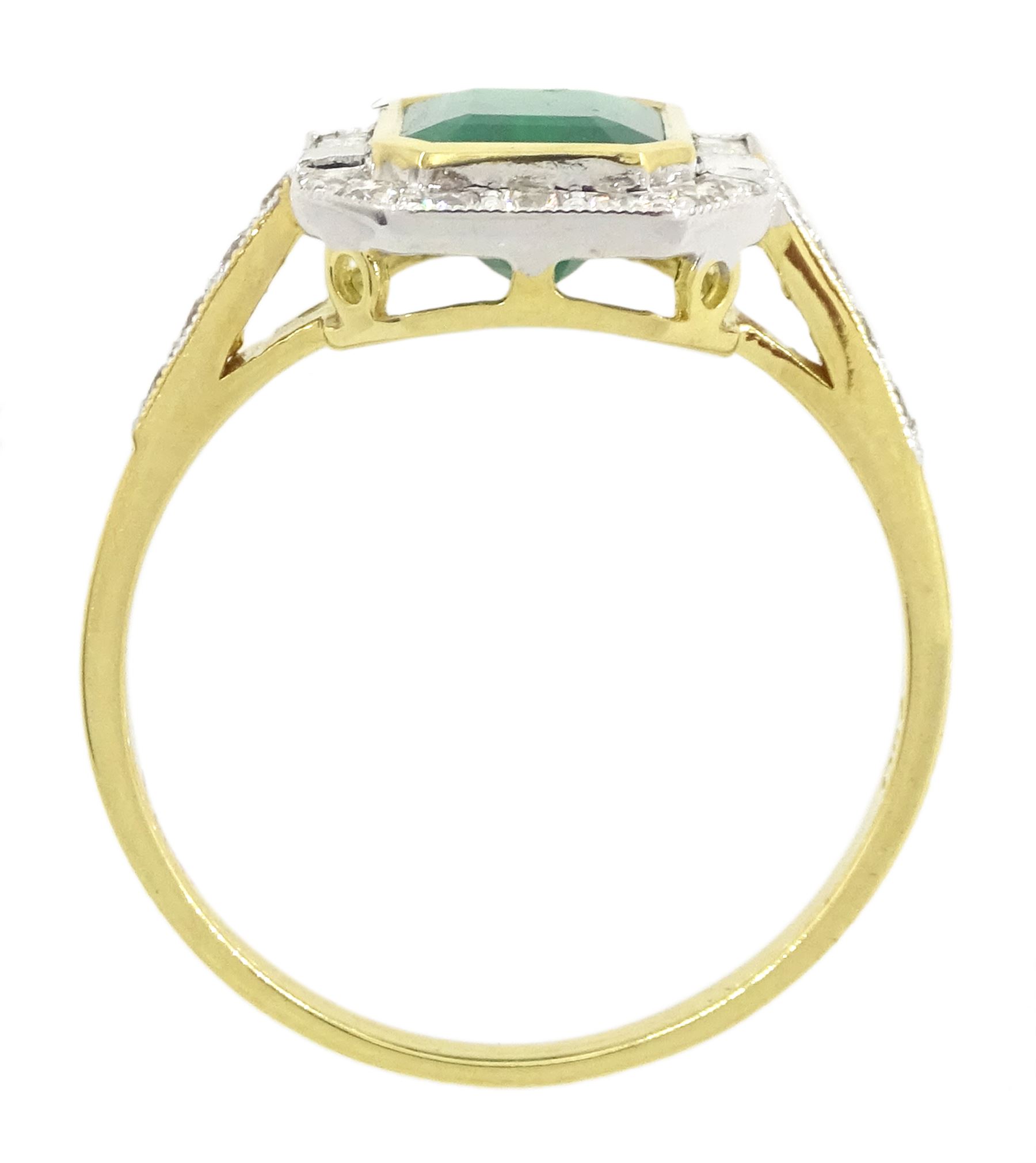 18ct gold emerald and diamond cluster ring, octagonal cut emerald of approx 1.50 carat, with milgrain set, round brilliant and baguette cut diamond surround and diamond set shoulders, stamped 750, total diamond weight approx 0.45 carat