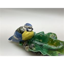Minton majolica leaf dish, modelled as a Blue Tit perched on a branch with acorns and an oak leaf, date cypher for 1868, impressed marks beneath, L21cm. 
