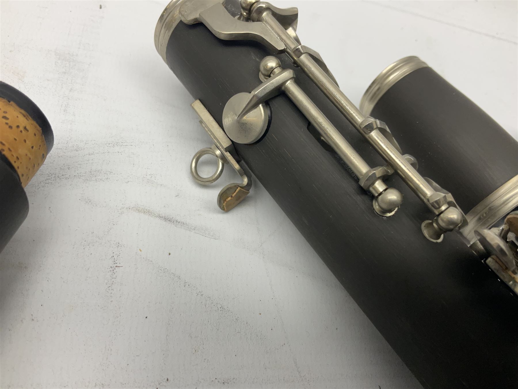 Windsor five-piece clarinet, serial no.EK05580; and Selmer Console clarinet with B&H mouth-piece; both cased (2)