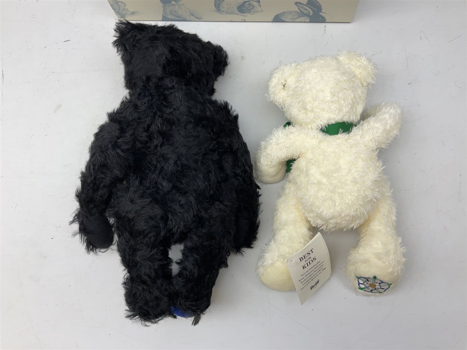 Steiff Special Edition Prince Charles black bear, with HRH coat of arms on foot and growler mechanism, with white tag ear label, in original box, together with Steiff 'Yorkshire Tyke' bear with rose on foot