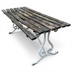White painted cast iron slatted garden bench with 110cm wide rectangular coffee table
