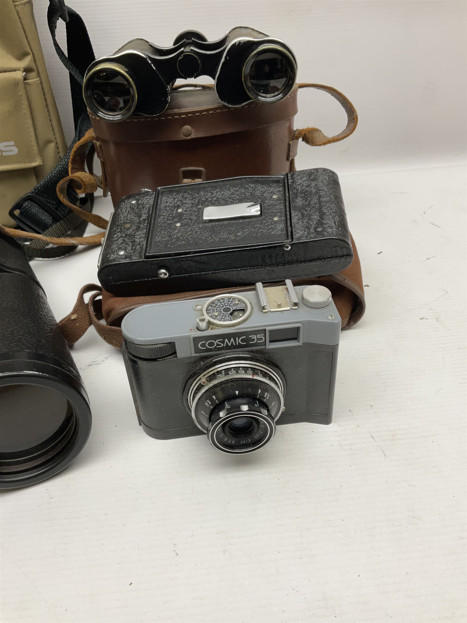  Russian Kronos binoculars 20x60, together with Farina 8x30 binoculars and two cameras, etc