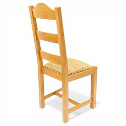 Late 20th century set of four light oak dining chairs, with green and red upholstery, on square supports united by H-stretcher 