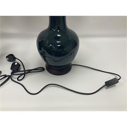 Pair of Chinese teal glazed table lamps, each of bottle form, raised upon circular hardwood bases, including shade H72cm 
