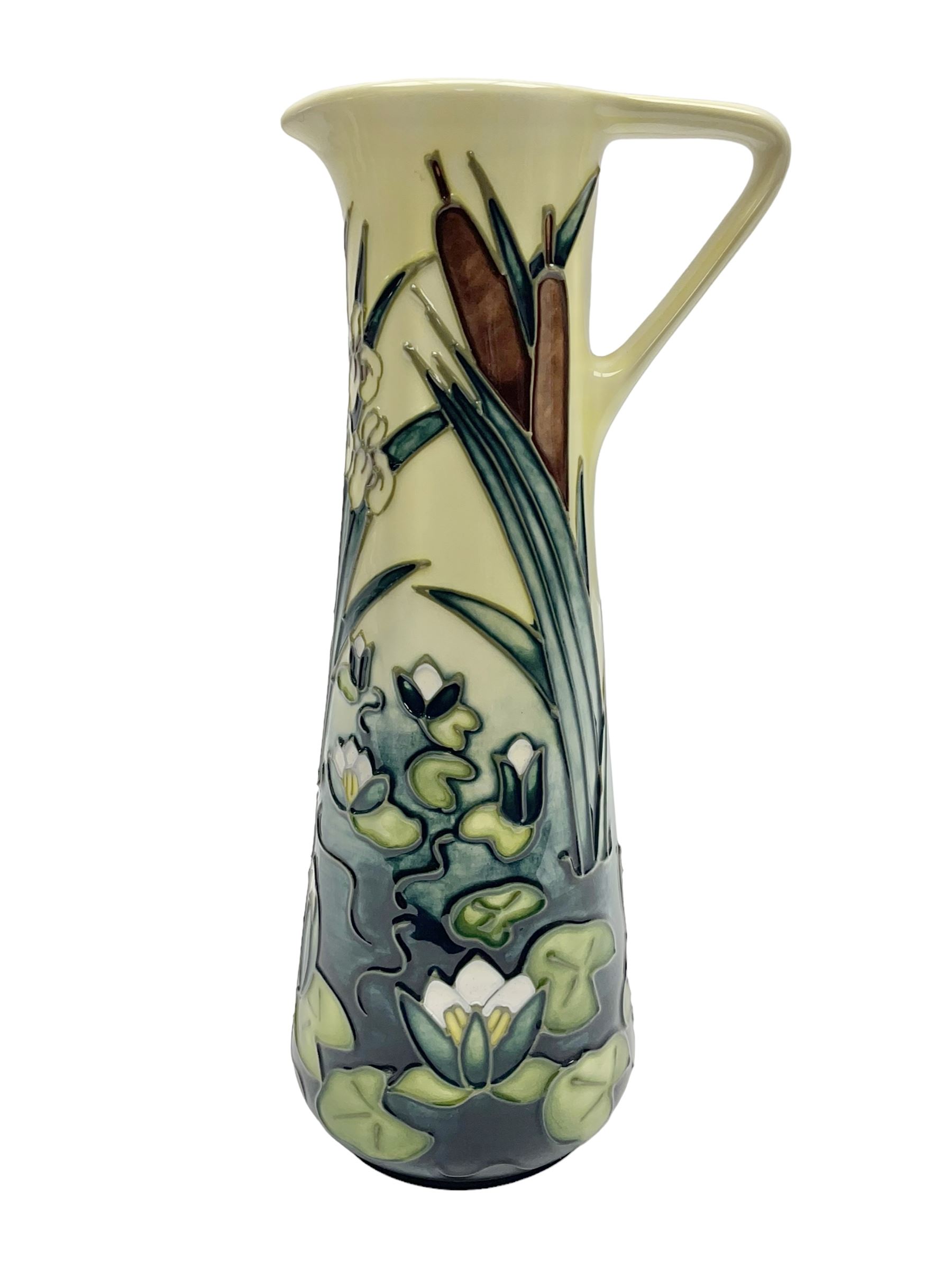 Moorcroft jug, decorated in Bulrush and Water Lily pattern, with printed marks beneath, H24cm