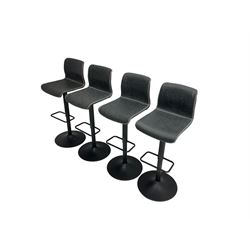 Four swivel adjustable bar stools