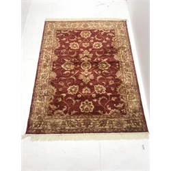 Persian red ground rug, central medallion, 187cm x 140cm