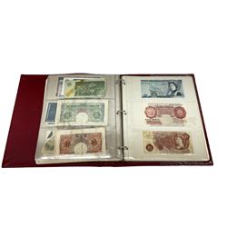 Great British and World banknotes, including Bank of England Peppiatt ten shillings 'D81D' and one pound 'L68E', Page ten pounds 'B63', Page ten pounds 'A70', various cashier one pound notes etc, The British Linen Bank one pound 15th April 1960, The Royal Bank of Scotland Ballantyne one pound 'No BQ 920468', other Scottish banknotes, various German notes etc, housed in a ring binder album 