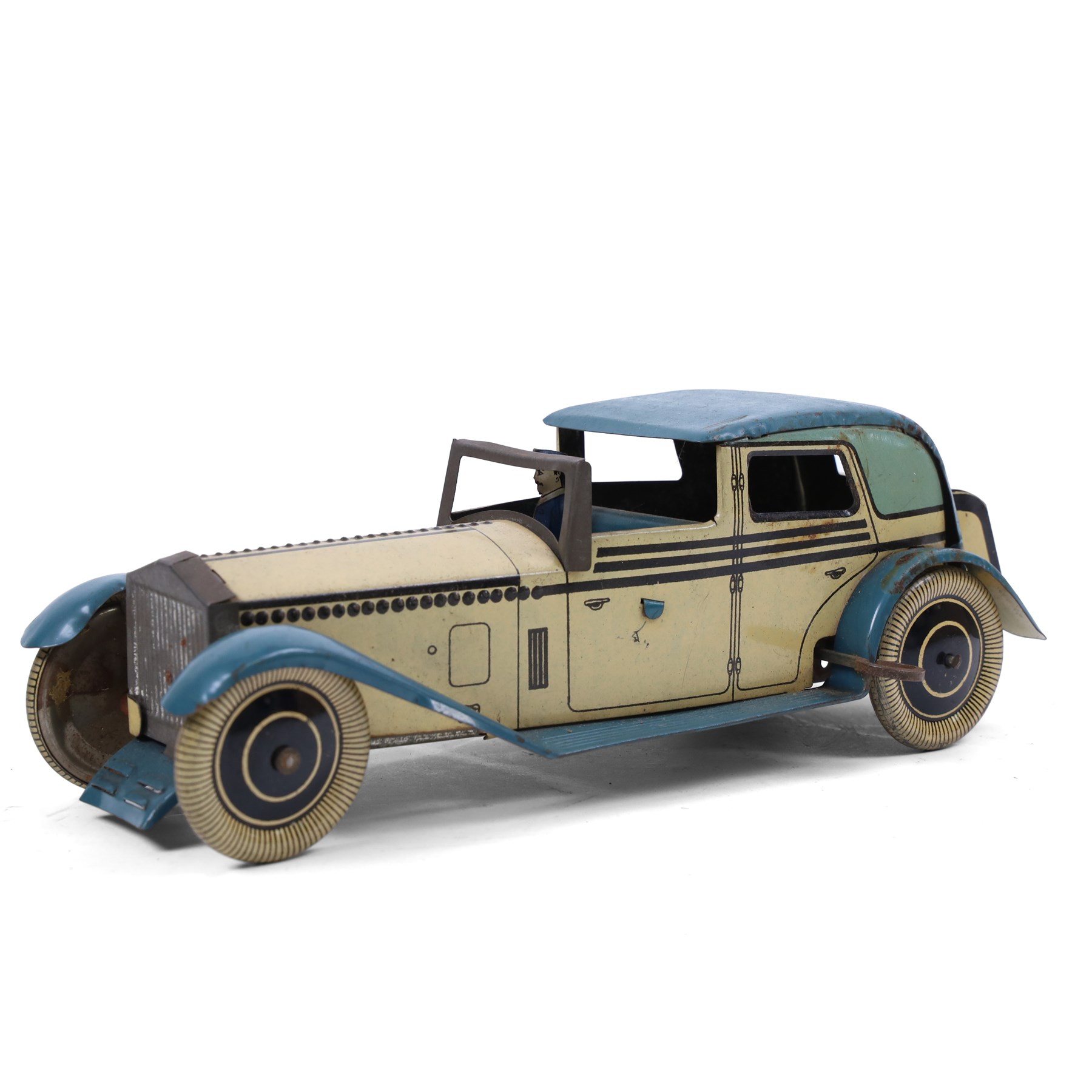 Wells tinplate clockwork limousine, the cream body, with blue roof and lithographed details, with driver and key, H8cm, L23cm