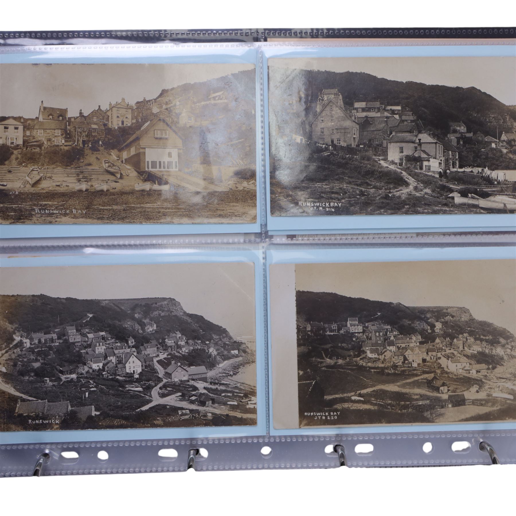 Five-hundred and thirty one late 19th and early 20th century real photographic postcards produced by J.T.Ross, depicting  daily life, village scenes, landmarks and street views of Whitby, the surrounding villages and South Teeside, including fifty-two modern copies, all housed within three postcard albums and accompanied by four copies of Ross, Photographer, Whitby 'The Life and Work of a Yorkshire Artist' by Colin Bullamore which provides a detailed overview of his life and work