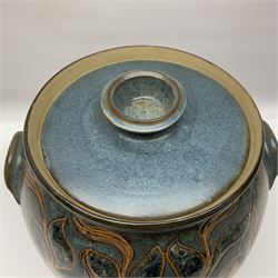 John Egerton (c1945-): studio pottery stoneware large twin handled pot, decorated with flowering sprigs on a blue ground, H33cm